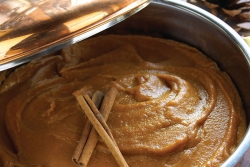 Sweet Potato Pumpkin Cazuela with cinnamon sticks on top